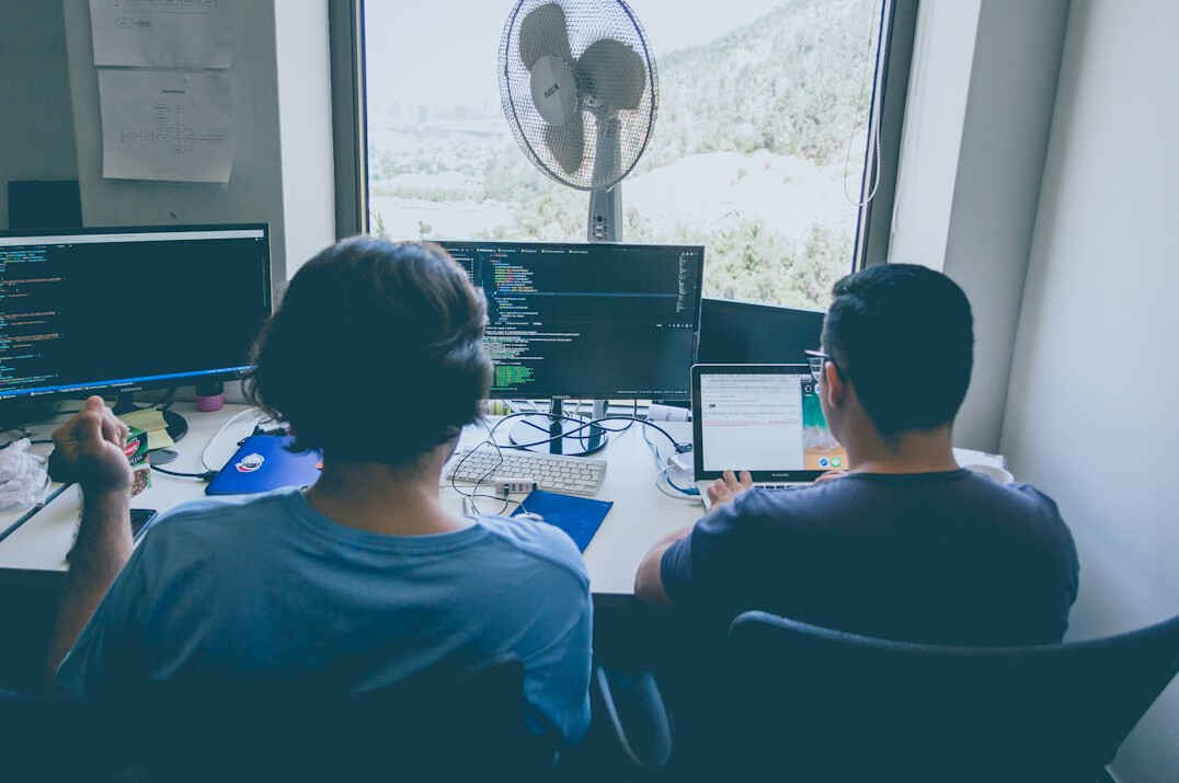 developers collaborating on code